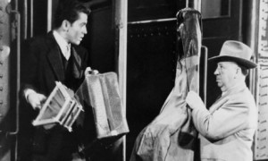 Farley Granger with Hitchcock in Strangers on a Train.