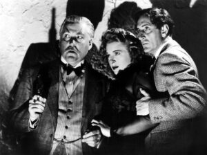 Nigel Bruce, Evelyn Ankers and Basil Rathbone in Sherlock Holmes and the Voice of Terror (1942).
