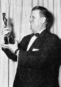 George Stevens with his Oscar for directing Giant.