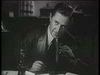 Reginald Owen as Sherlock Holmes.