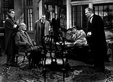 Louis Hayward, C. Aubrey Smith, Barry Fitzgerald, Richard Haydn, Mischa Auer, and Walter Huston in And Then There Were None (1945).