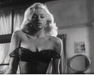Diana Dors as the irresistibly sexy temptress Calico in Tread Softly Stranger (1958).