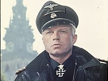 Hardy Kruger as Generalmajor der Waffen-SS Karl Ludwig in A Bridge Too Far (1977).