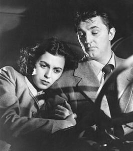 Faith Domergue and Robert Mitchum.