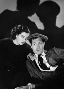 Rosalind Russell and Robert Montgomery in Night Must Fall.