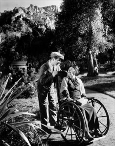 Robert Montgomery and Dame May Whitty in Night Must Fall.