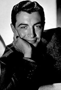 Robert Taylor, fading star of The Law and Jake Wade (1958).