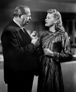 Charles Coburn and Helen Walker in Impact.