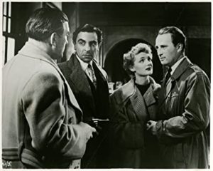 Martin Benson, Barbara Murray and Sydney Tafler in Mystery Junction (1951). 