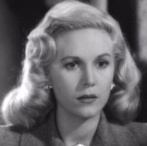 Rita Corday as Mona Clyde.