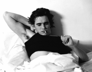Bruce Weber photo of Matt Dillon in bed.