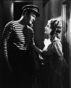 John Wayne and Diana Gibson in Adventure's End (1937).