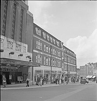 A general view of part of London Road in GuA general view of part of London Road in Guildford, Surrey, with the cinema showing the film They Were Sisters (1945).ildford, Surrey, showingarly visible is the cinema, showing the film They Were Sisters (1945)