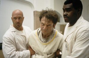 In the Mouth of Madness (1994) with Sam Neill.