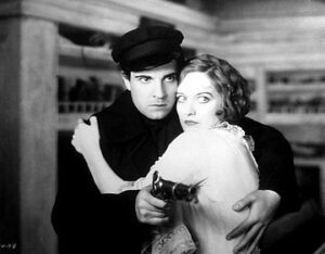 Ramon Novarro with Joan Crawford in Across to Singapore (1928).