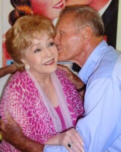 Tab Hunter and Debbie Reynolds on the set of Tab Hunter Confidential.