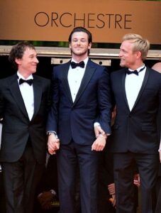 Bertrand Bonello, Gaspard Ulliel, and Jérémie Renier at the 2014 Cannes Film Festival.